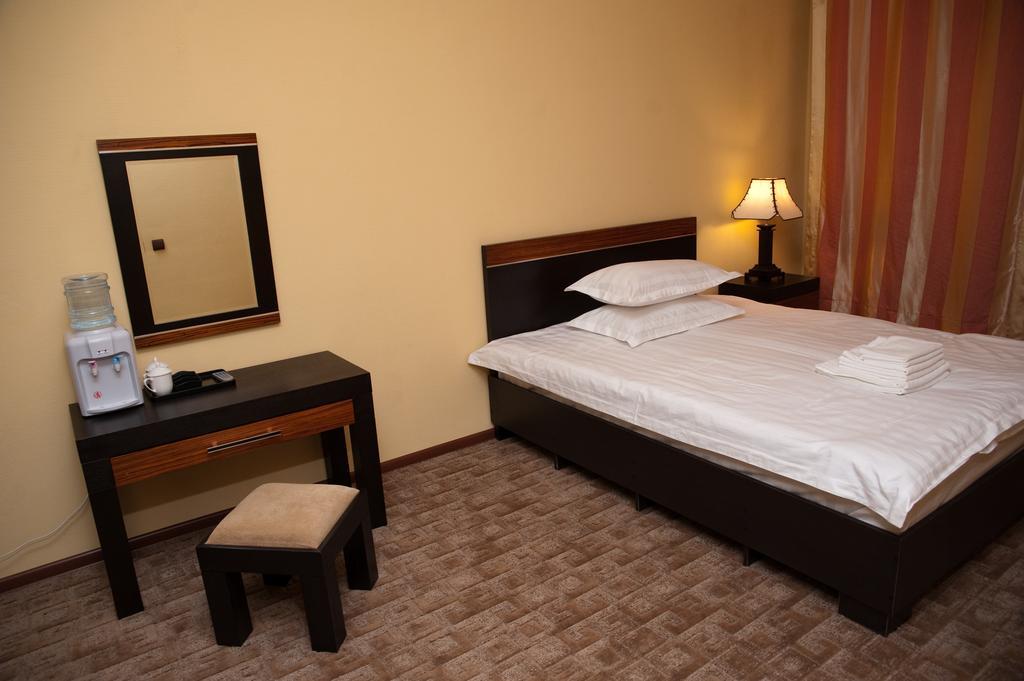 Artastana Hotell Rum bild