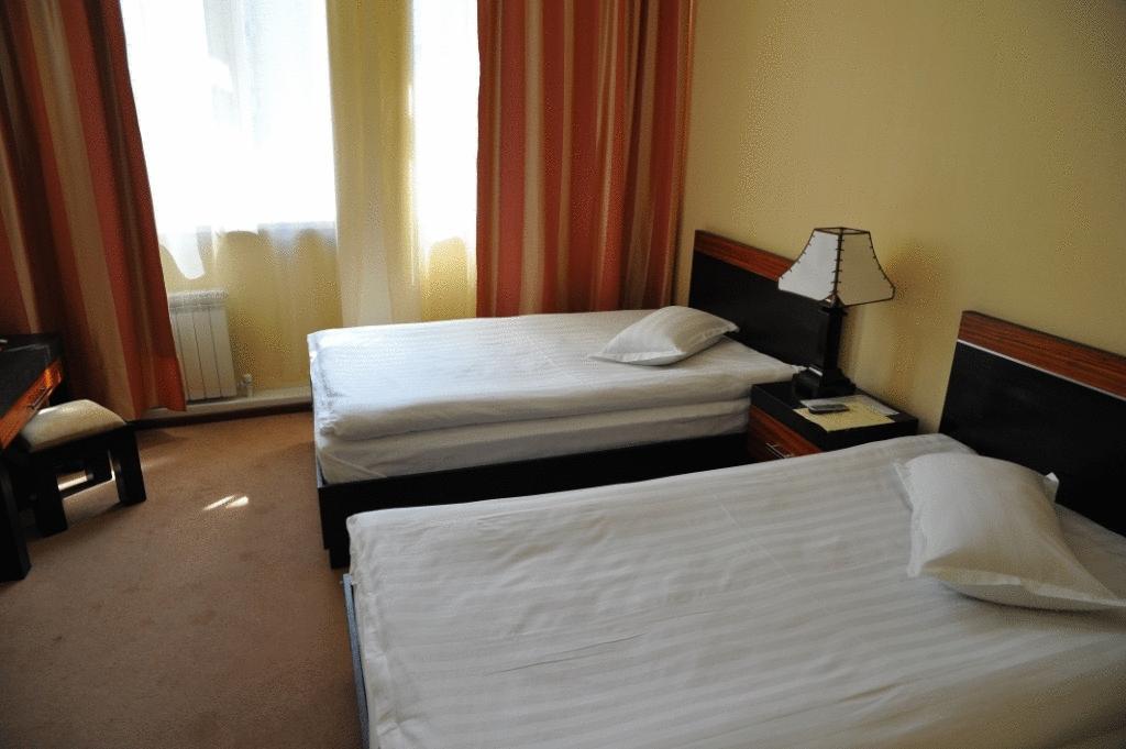 Artastana Hotell Rum bild